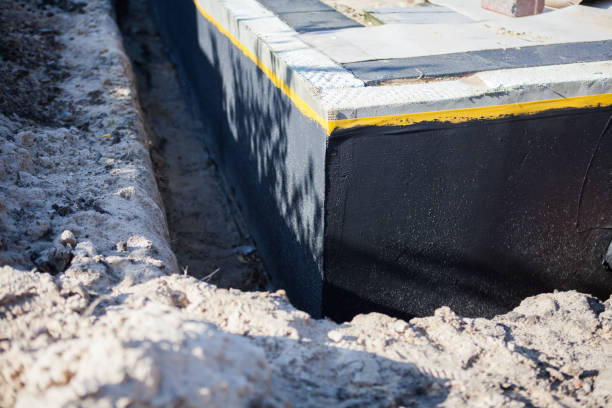 Professional Waterproofing technician working in Island Lake, IL